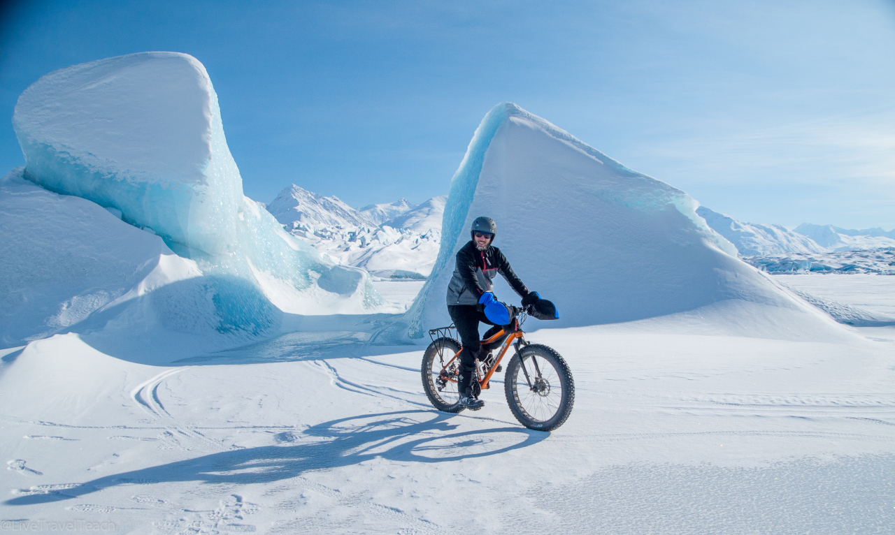 Mike biking to Knik Glacier. Read this article to discover the best adventures in Alaska
