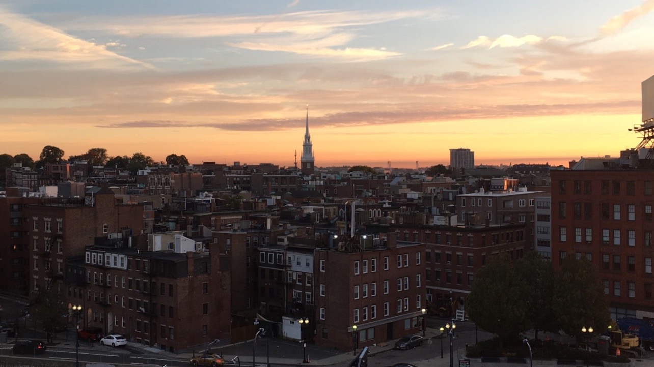 Boston Downtown sunset. Read this article and go Boston sightseein. Create your Boston bucket list